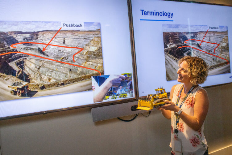 Woman holding lego truck